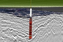 Synopsis of 3D seismic data and information from a borehole into a basaltic basement. Figure courtesy by P. Carlevaris using PaleoScan software