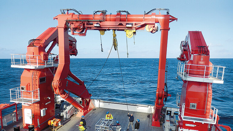View of the rear working deck with the large A-frame crane