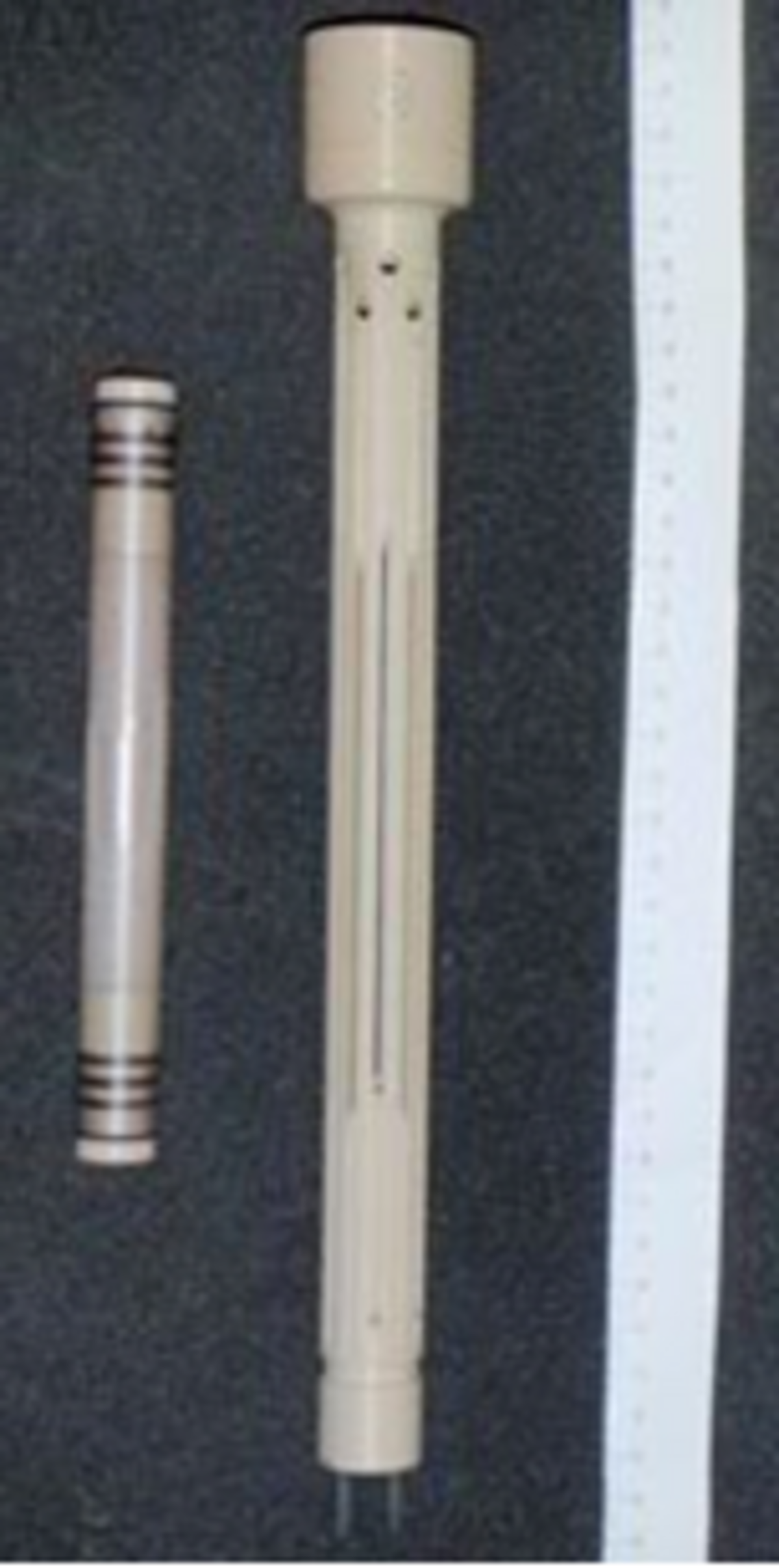 Setup of the high-pressure flow-through sapphire cell in the magnet bore.