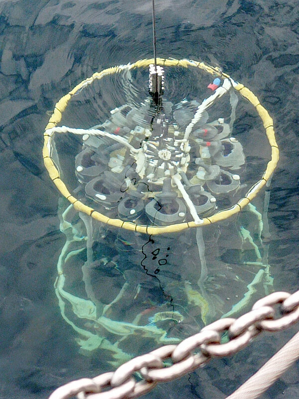 Figure 5: Deploying a CTD-rosette to take water samples at different depths. (Photo: Kenneth Arinaitwe)