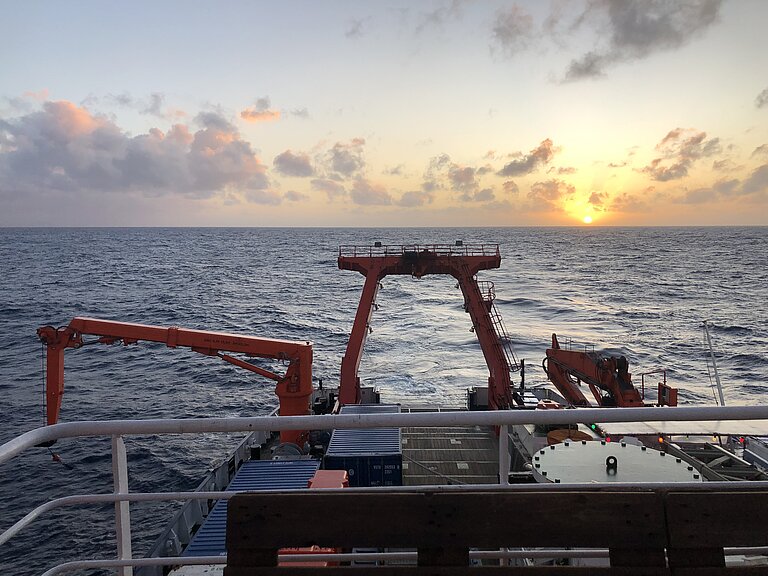 The stern of a research vessel with a crane